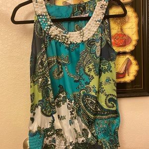 Paisley tank with white beads around the neckline. Worn only once.